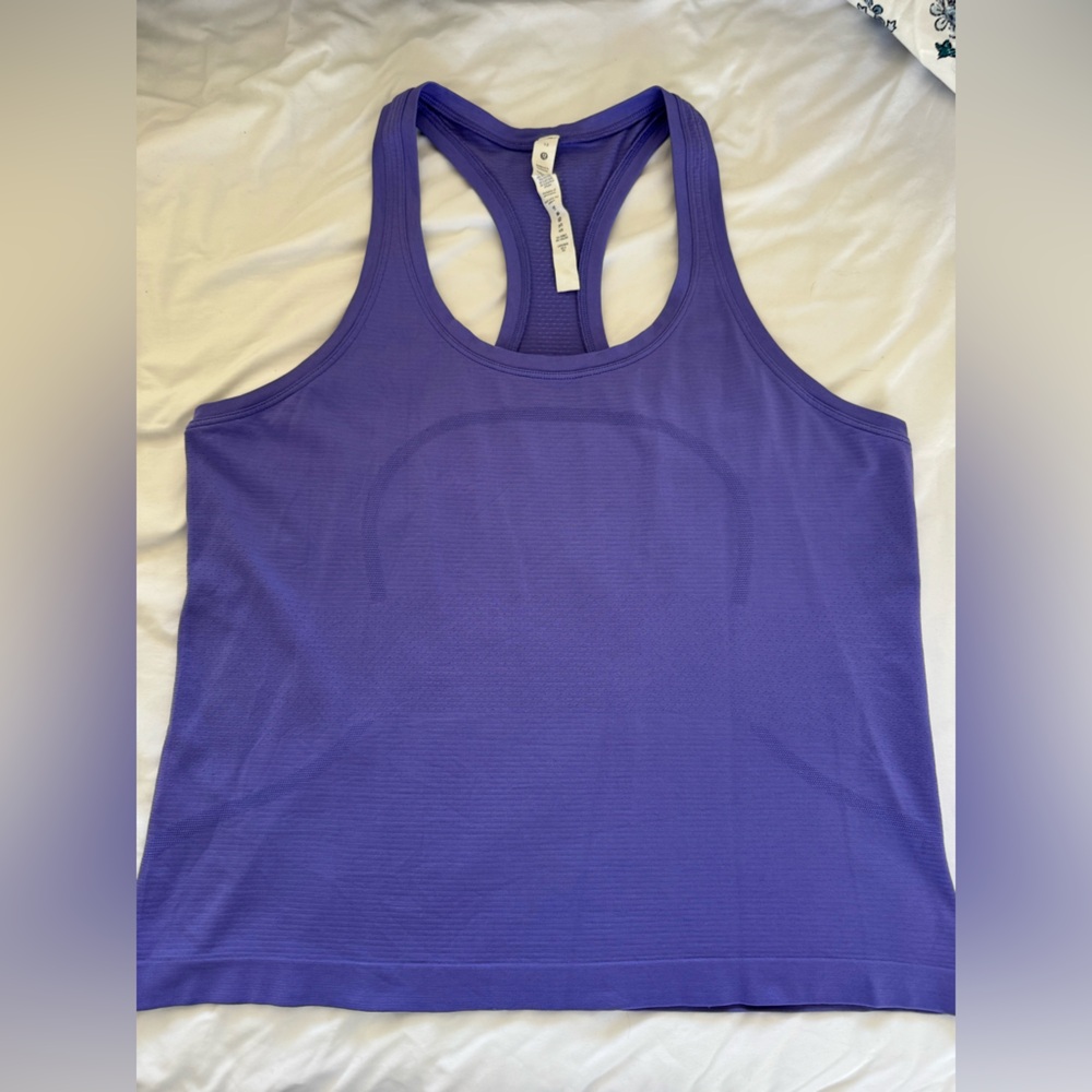 Lululemon Swiftly Tech Racerback Tank 2.0
Waist Length- purple, worn a few times